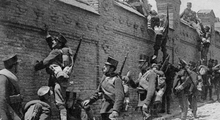 975px-Soldados_espanoles_escalando_un_muro-735x400-1.jpg